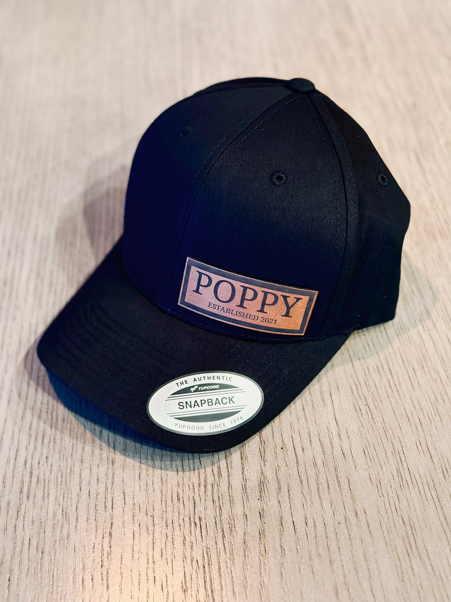 Custom Leather Patch on Yupoong 6006 Flat Bill Trucker Cap