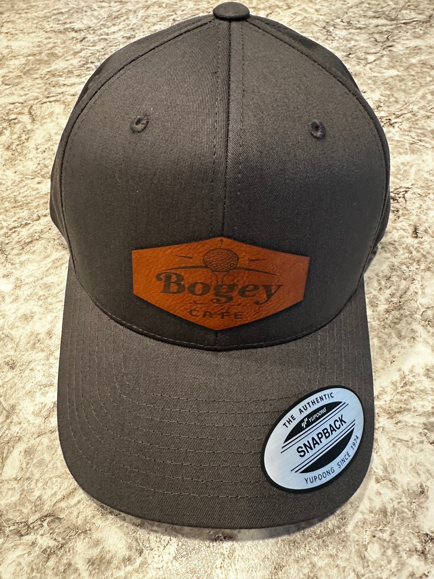 Custom Leather Patch on Yupoong 6006 Flat Bill Trucker Cap